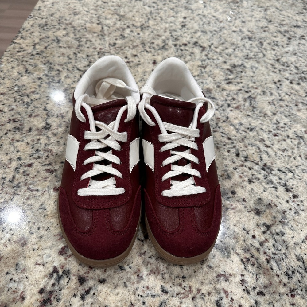 Brand new, never worn.  Burgundy tennis shoe. Size 7.5